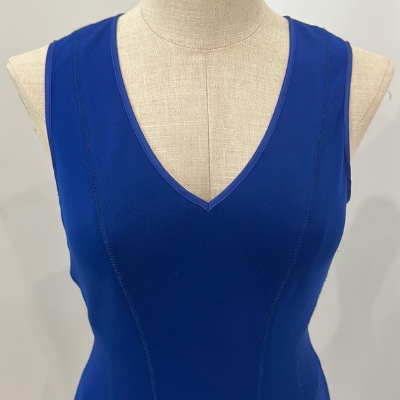 Classic style combines with modern, edge trend for a dress that is flattering. - Picture 2 of 8